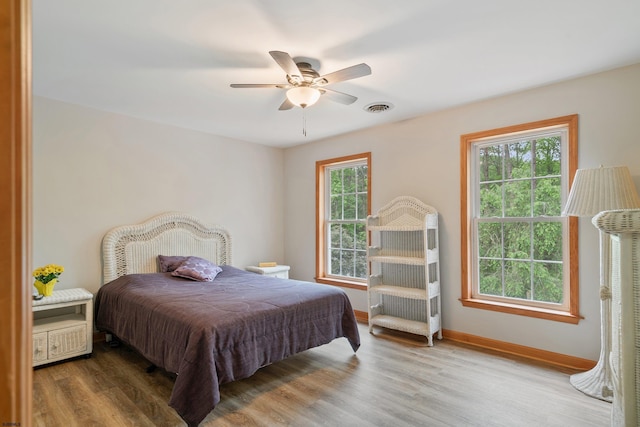 10 Hillside Ave, New Gretna, NJ 08087 - bedroom with multiple windows, wood finished floors, and a ceiling fan