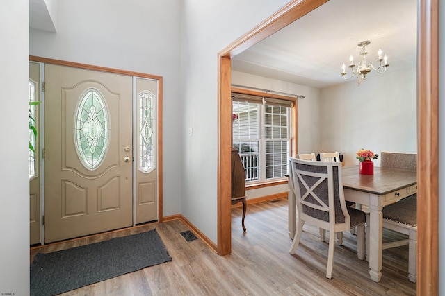 10 Hillside Ave, New Gretna, NJ 08087 - entryway with a chandelier and light wood-style flooring
