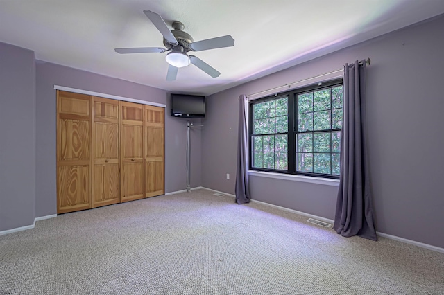298 Mattix Run Unit 298, Galloway Township, NJ 08205 - unfurnished bedroom featuring carpet floors, a ceiling fan, and a closet