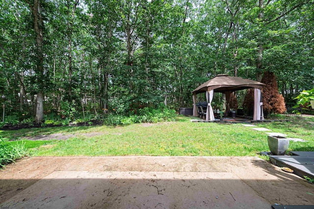 298 Mattix Run Unit 298, Galloway Township, NJ 08205 - view of grassy yard featuring a gazebo and a patio area