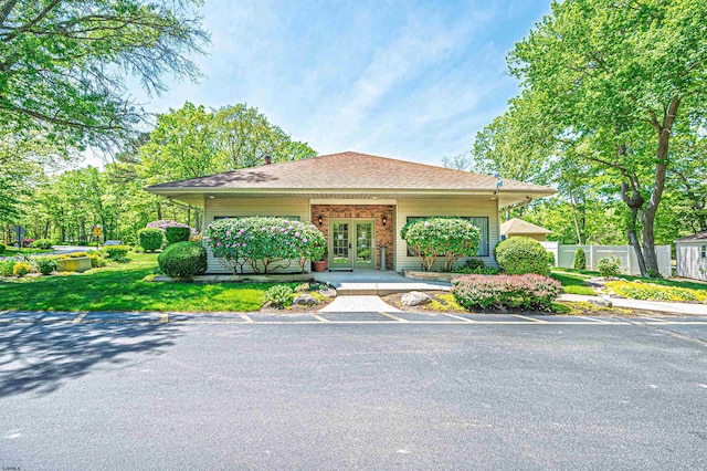 298 Mattix Run Unit 298, Galloway Township, NJ 08205 - view of front of property featuring a shingled roof, a porch, and french doors
