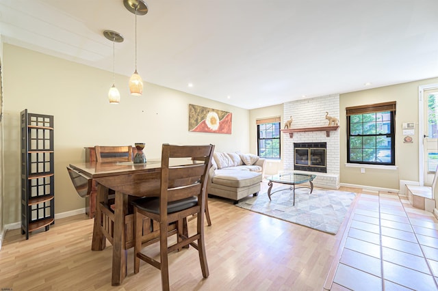 298 Mattix Run Unit 298, Galloway Township, NJ 08205 - dining area with light wood-type flooring, a brick fireplace, and recessed lighting