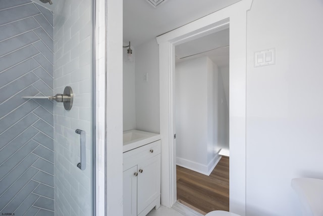 412 11th St Unit 2, Ocean City, NJ 08226 - bathroom featuring a stall shower, vanity, and wood finished floors