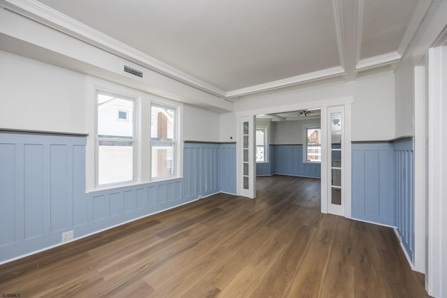 412 11th St Unit 2, Ocean City, NJ 08226 - unfurnished room featuring a wainscoted wall, wood finished floors, crown molding, and a decorative wall