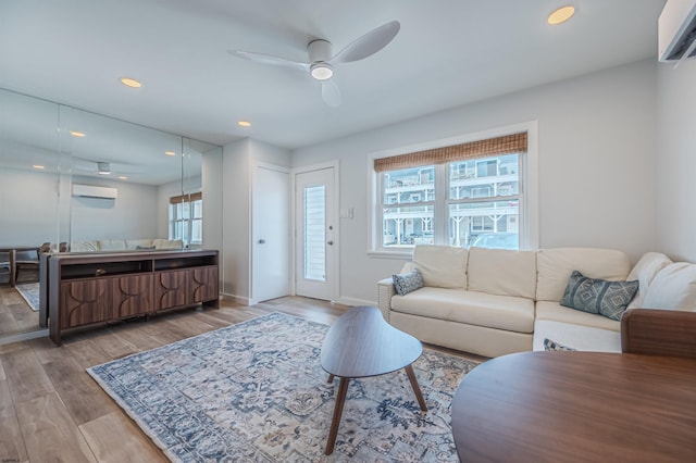3801 Ocean Ave Unit 2, Brigantine, NJ 08203 - living area with a ceiling fan, an AC wall unit, wood finished floors, and recessed lighting