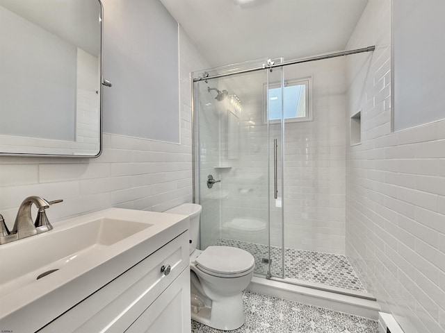 3400 W Brigantine Ave Unit 3, Brigantine, NJ 08203 - bathroom featuring tile walls, a stall shower, vanity, and wainscoting
