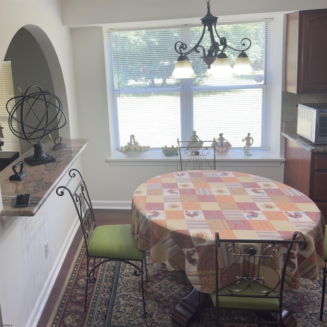 2453 Lahn Ln, Mays Landing, NJ 08330 - dining area with dark wood-style floors, healthy amount of natural light, and a chandelier