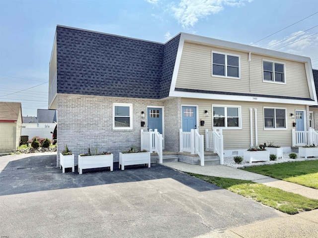 3400 W Brigantine Ave Unit 4, Brigantine, NJ 08203 - view of front of house featuring roof with shingles and brick siding