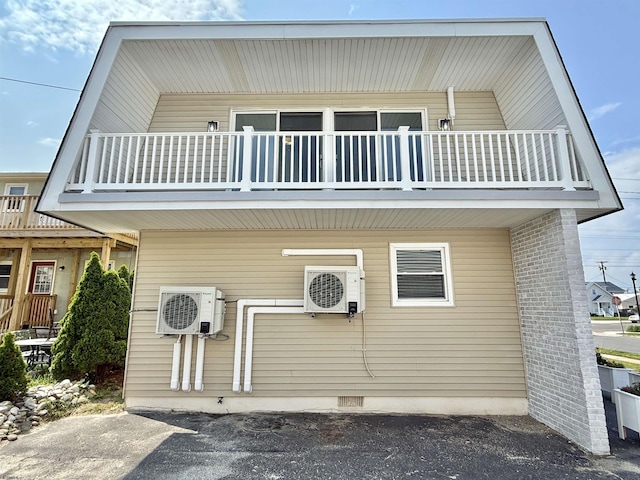 3400 W Brigantine Ave Unit 4, Brigantine, NJ 08203 - view of front facade featuring a balcony and crawl space