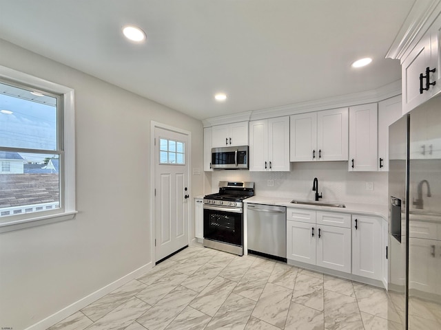 3400 W Brigantine Ave Unit 5, Brigantine, NJ 08203 - kitchen featuring stainless steel appliances, light marble finish floors, light countertops, white cabinets, and recessed lighting