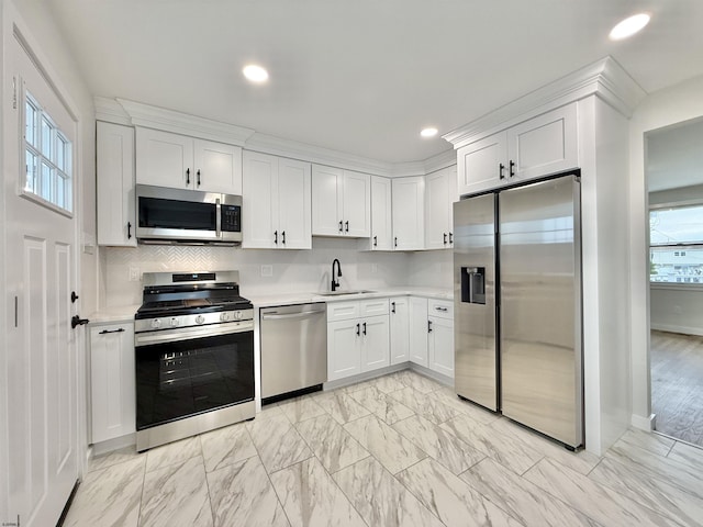 3400 W Brigantine Ave Unit 5, Brigantine, NJ 08203 - kitchen featuring appliances with stainless steel finishes, light countertops, white cabinetry, and recessed lighting