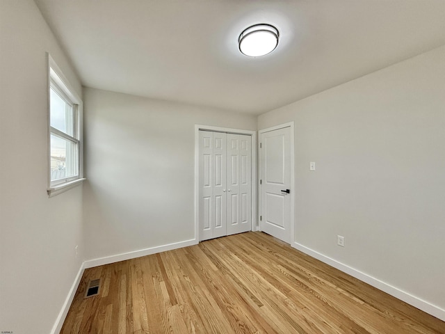 3400 W Brigantine Ave Unit 5, Brigantine, NJ 08203 - unfurnished bedroom with light wood-style flooring and a closet
