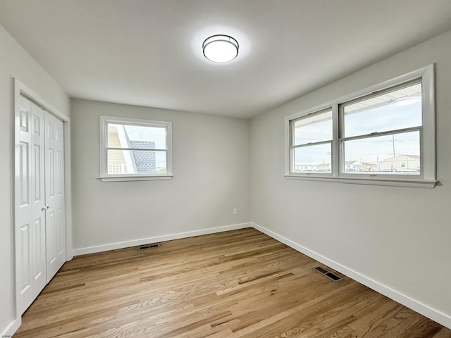 3400 W Brigantine Ave Unit 5, Brigantine, NJ 08203 - unfurnished bedroom with light wood-style flooring and a closet