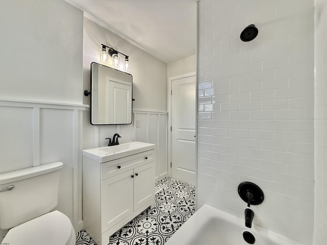 3400 W Brigantine Ave Unit 5, Brigantine, NJ 08203 - full bath featuring vanity, tile patterned flooring, shower / tub combination, wainscoting, and a decorative wall