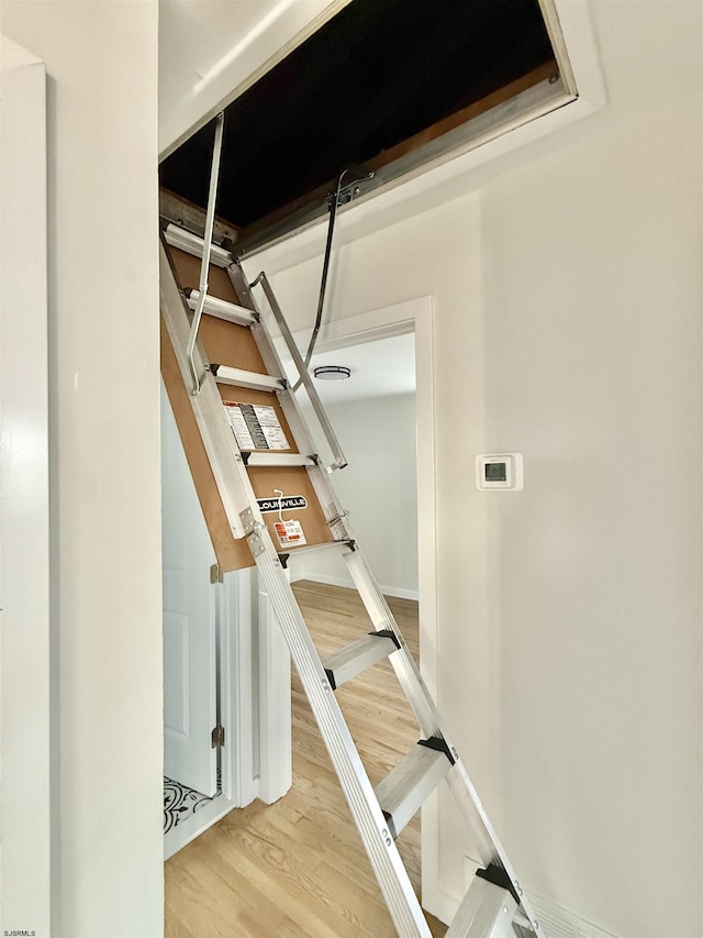 3400 W Brigantine Ave Unit 5, Brigantine, NJ 08203 - staircase featuring wood finished floors