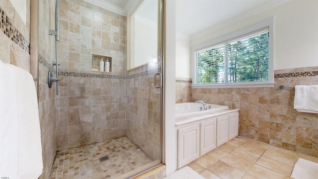 104 Locust Ave, Egg Harbor Township, NJ 08234 - full bath with ornamental molding, a stall shower, a bath, tile walls, and a wainscoted wall