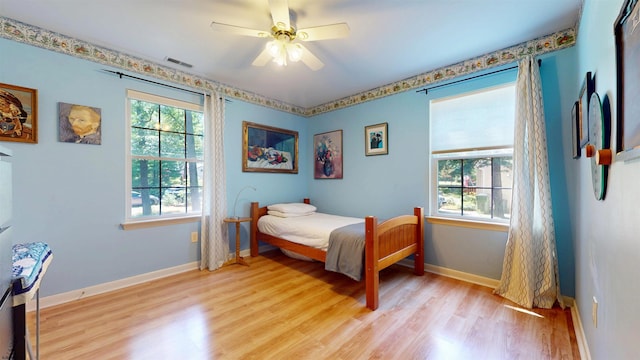 104 Locust Ave, Egg Harbor Township, NJ 08234 - bedroom featuring multiple windows, light wood-style flooring, and ceiling fan