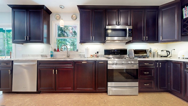 104 Locust Ave, Egg Harbor Township, NJ 08234 - kitchen featuring stainless steel appliances, healthy amount of natural light, and light stone countertops