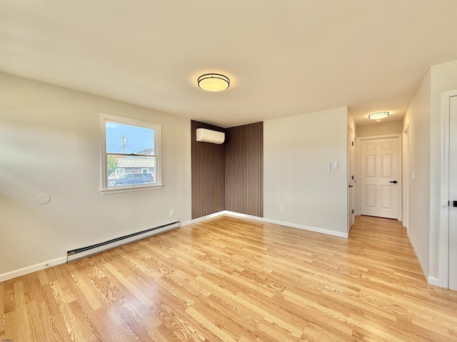 3400 W Brigantine Ave, Brigantine, NJ 08203 - unfurnished room with baseboard heating, light wood-style flooring, and an AC wall unit