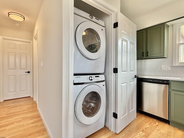 3400 W Brigantine Ave, Brigantine, NJ 08203 - washroom with stacked washing machine and dryer and light wood-style floors