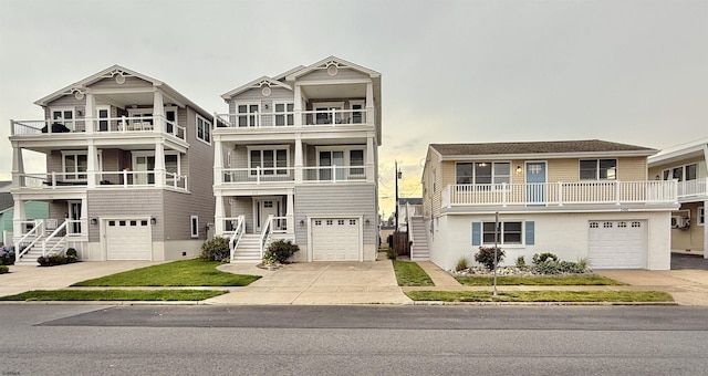 3400 W Brigantine Ave, Brigantine, NJ 08203 - view of front of home featuring driveway, a garage, and a balcony