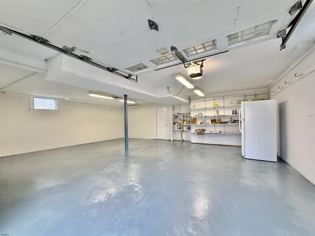 3400 W Brigantine Ave, Brigantine, NJ 08203 - garage with freestanding refrigerator and a garage door opener