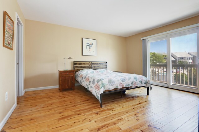 24 Coquille Beach Dr Unit 24, Brigantine, NJ 08203 - bedroom featuring light wood-type flooring and access to outside