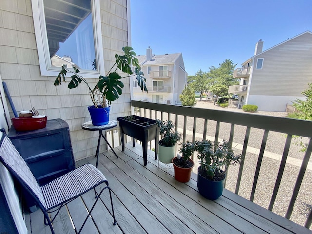 24 Coquille Beach Dr Unit 24, Brigantine, NJ 08203 - wooden terrace with a residential view