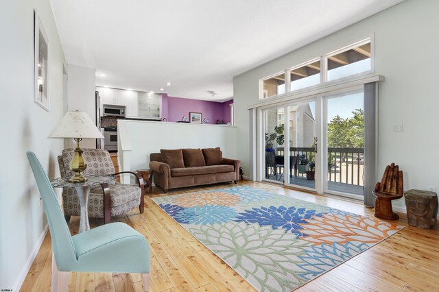 24 Coquille Beach Dr Unit 24, Brigantine, NJ 08203 - living room featuring hardwood / wood-style flooring and recessed lighting