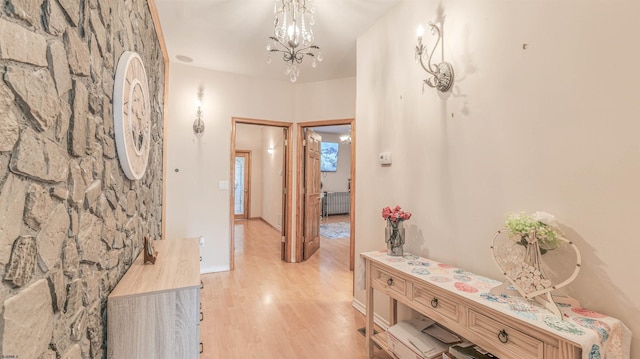 6015 Main St, Mays Landing, NJ 08330 - hallway with light wood finished floors and a chandelier
