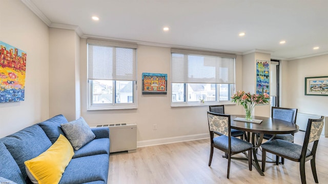 5000 Boardwalk Unit 107, Ventnor, NJ 08406 - dining space featuring radiator heating unit, crown molding, wood finished floors, and recessed lighting