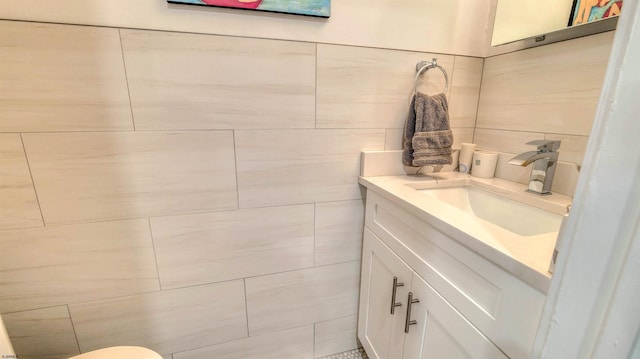5000 Boardwalk Unit 107, Ventnor, NJ 08406 - half bathroom with vanity and tile walls