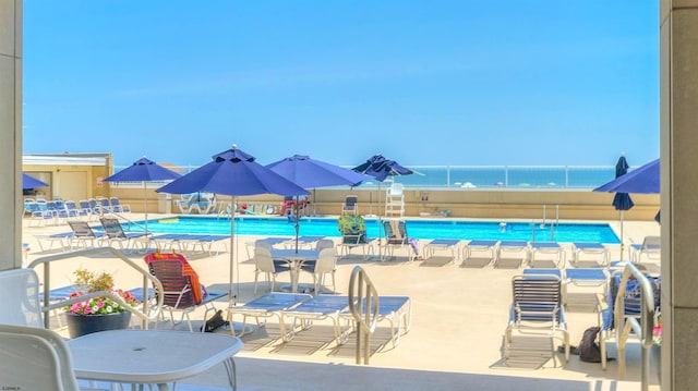 5000 Boardwalk Unit 107, Ventnor, NJ 08406 - community pool featuring a patio