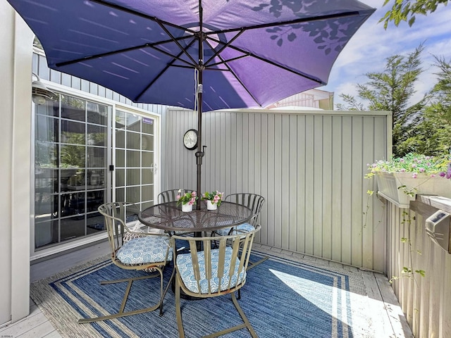 417 Albacore Ln, Brigantine, NJ 08203 - wooden terrace featuring outdoor dining area