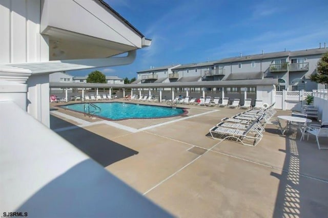 417 Albacore Ln, Brigantine, NJ 08203 - community pool with a patio area