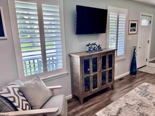 1304 Roberts Ave, Somers Point, NJ 08244 - living room featuring dark wood-type flooring and baseboards