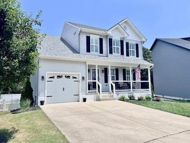 1304 Roberts Ave, Somers Point, NJ 08244 - view of front of house with an attached garage, covered porch, concrete driveway, and a shingled roof