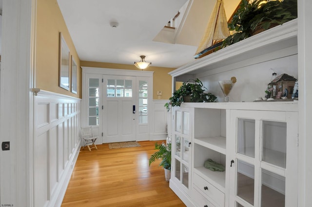 16 Harbor Rd, Ocean City, NJ 08226 - foyer with a decorative wall, light wood-style flooring, and a wainscoted wall