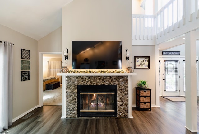 12 Fischer Rd, Linwood, NJ 08221 - living area featuring wood finished floors, high vaulted ceiling, and a glass covered fireplace