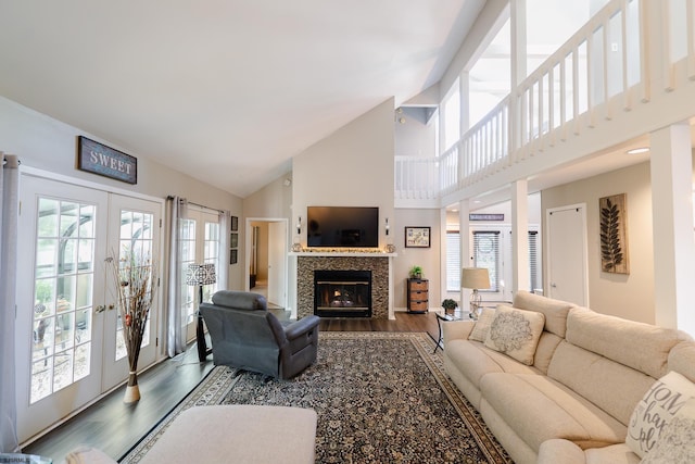 12 Fischer Rd, Linwood, NJ 08221 - living area with high vaulted ceiling, wood finished floors, french doors, and a tiled fireplace