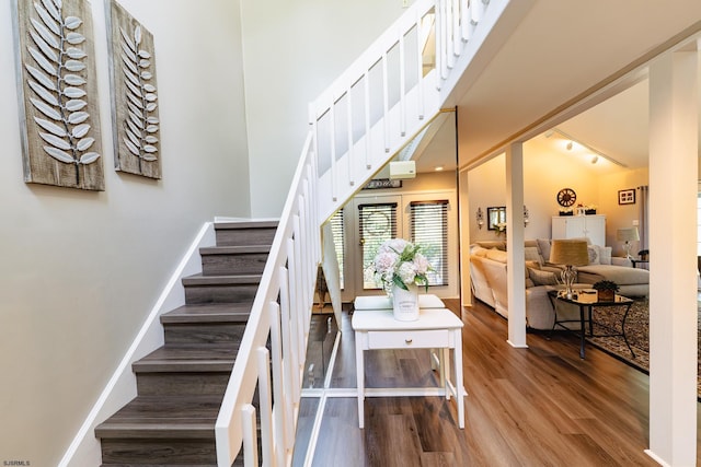 12 Fischer Rd, Linwood, NJ 08221 - stairs with wood finished floors, track lighting, and a high ceiling