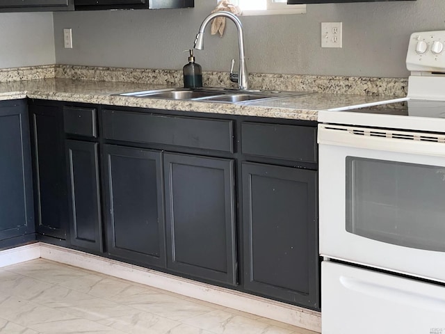 kitchen featuring light tile flooring, sink, and white range with electric stovetop