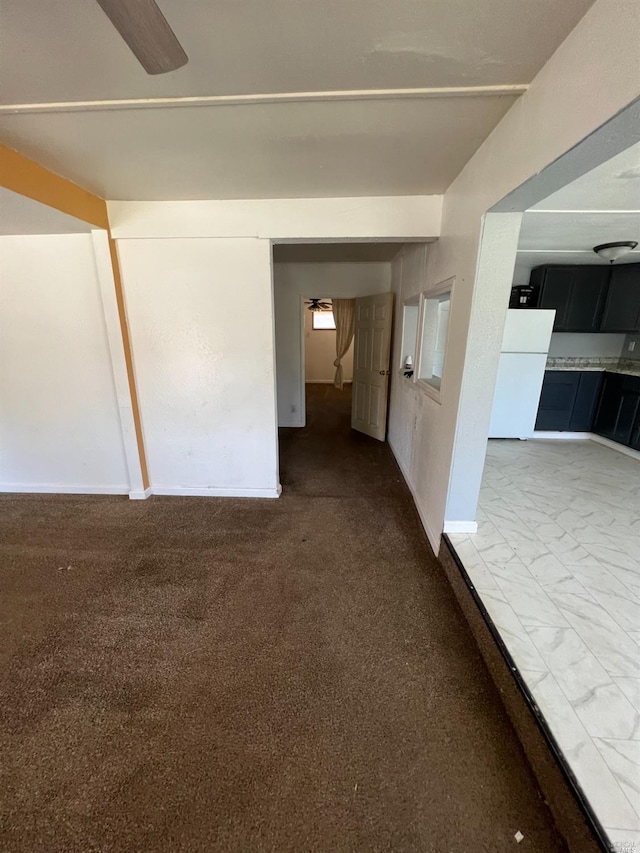 hallway with light colored carpet