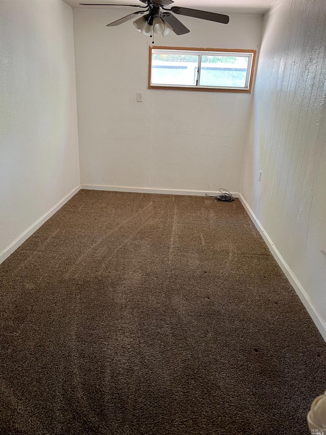 carpeted empty room with ceiling fan