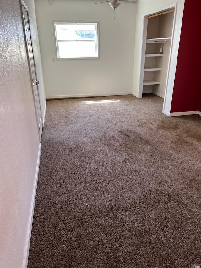 unfurnished bedroom with carpet flooring and ceiling fan