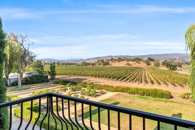 balcony featuring a rural view