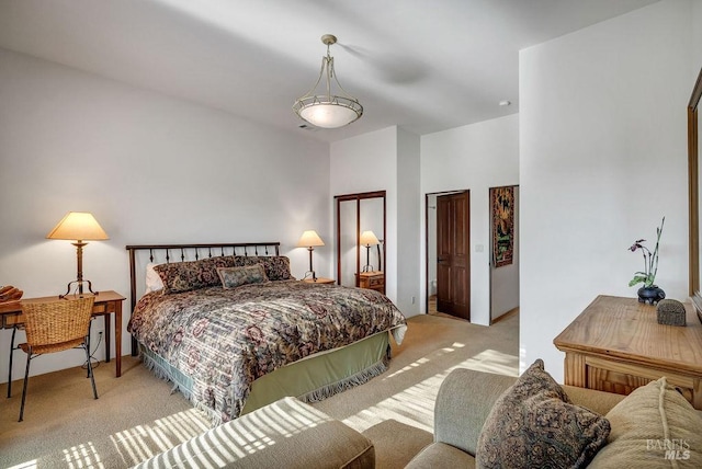 bedroom with light colored carpet