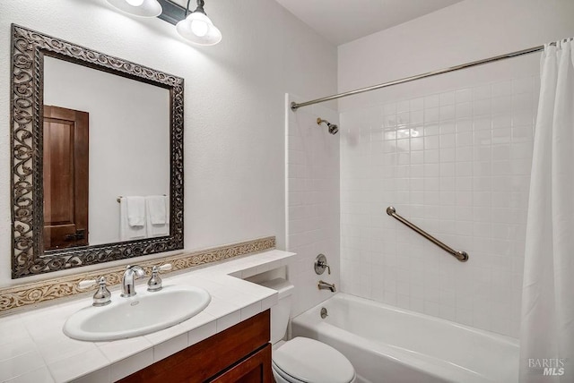 full bathroom with shower / bath combo with shower curtain, toilet, and vanity with extensive cabinet space