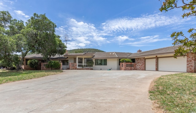 ranch-style home with a garage