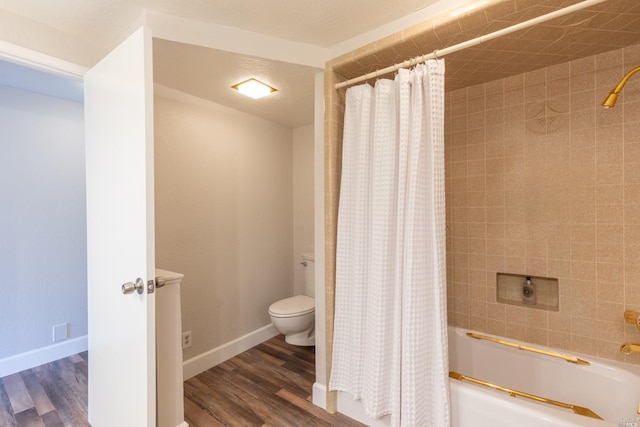 bathroom with shower / bath combination with curtain, toilet, and hardwood / wood-style floors